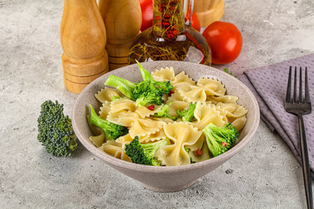 Vegetarian cuisine - Italian pasta farfalle with broccoliの写真素材