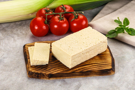 Soya vegan tofu cheese brick over board