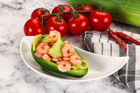 Dietary avocado cut with prawn and lemon juiceの写真素材