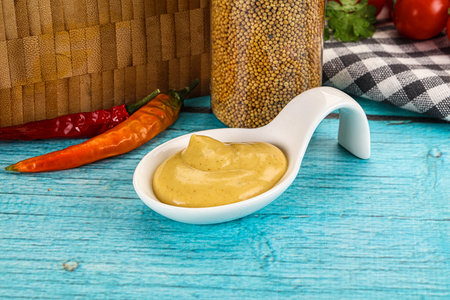 Spicy yellow mustard sauce dip flavoringの写真素材
