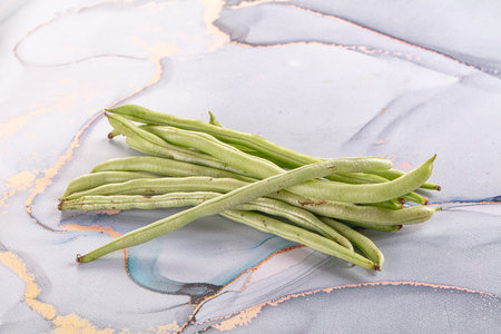 Raw green string beans heap for cooking