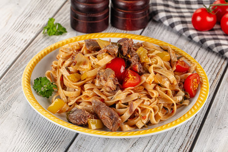 Asian udon noodles with beef and vegetablesの写真素材