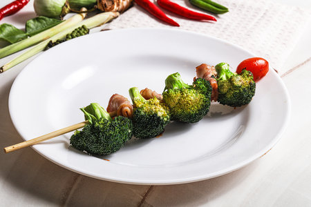 Thai Street foof satay with bacon and broccoli skewerの写真素材