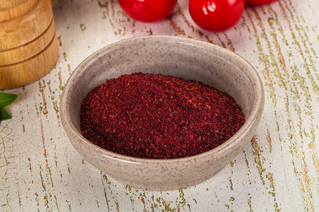 Natural organic Sumah powder for culinary in the bowl