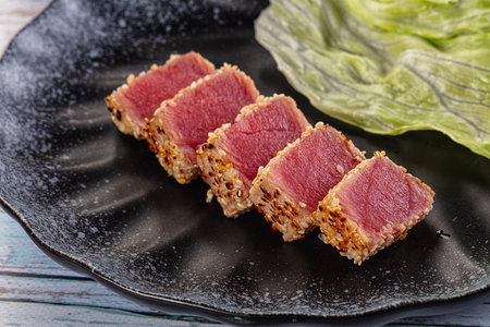 Tuna tataki roasted and raw in sesame seedsの写真素材