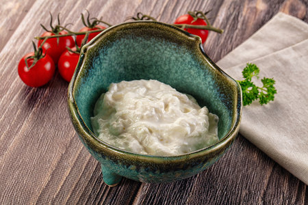 Italian delicous stracciatella young soft cheese in the bowlの写真素材