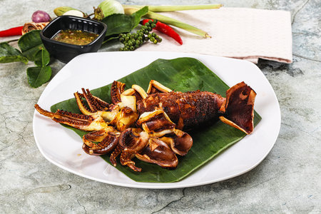Delicous Grilled squid with sauce and spices