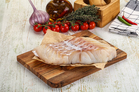 Raw Pollok fish fillet for cooking