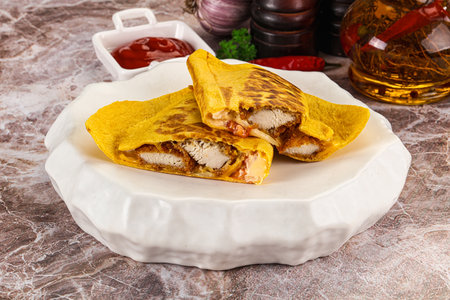Spicy quesadillas with chicken fillet and cheeseの写真素材