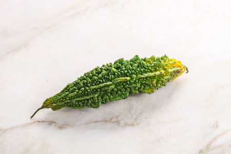 Raw green exotic tropical bitter melon vegetable
