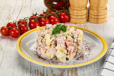 Russian traditional Olivier salad with sausagesand mayonaiseの写真素材