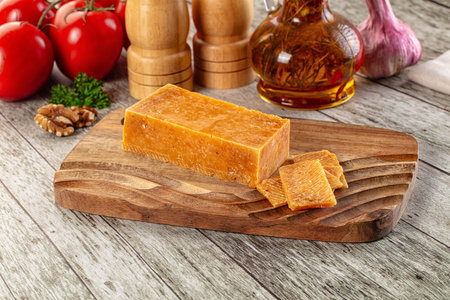 Gourmet hard aged parmesan cheese witj slicesの写真素材