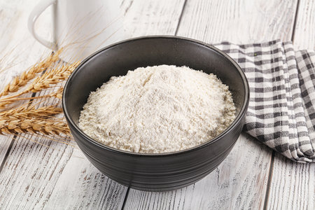 White Wheat flour heap for bakeの写真素材