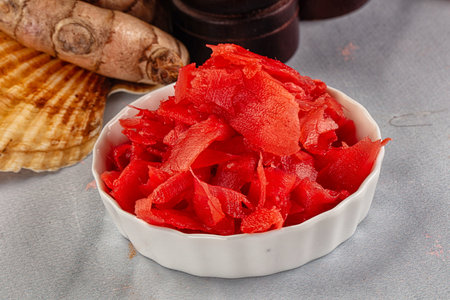 Pickled red ginger in the bowl for Japanese cuisineの写真素材