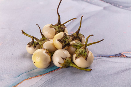 Raw white small asian baby eggplantの写真素材