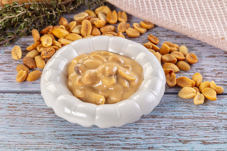 Raw Peanut butter spread with nuts