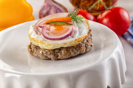 Beefsteak chop minced meat with roasted egg