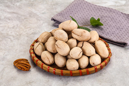 Crunchy pecan nut snack in the bowl