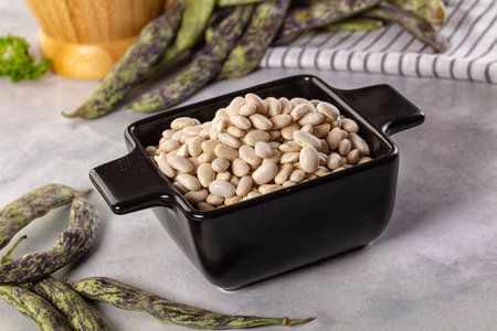 Raw dry white beans kidney heap