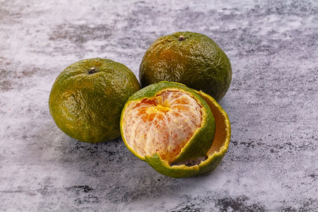 Ripe green sweet organic orange citrusの写真素材