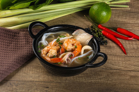 Vietnamese Pho Bo soup with seafood prawn and squid