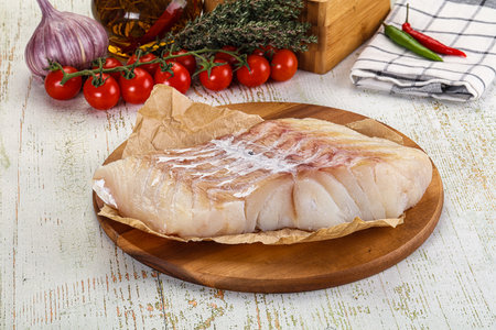 Raw Pollok fish fillet for cooking