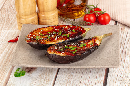 Baked eggplant with teriyaki sause and sesame seedsの写真素材