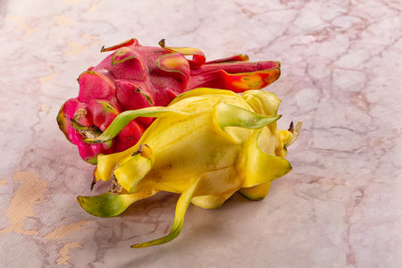 Sweet fresh red and yellow Dragon fruit pitahayaの写真素材