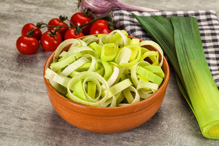 Fresh ripe green leek slices in the bowl