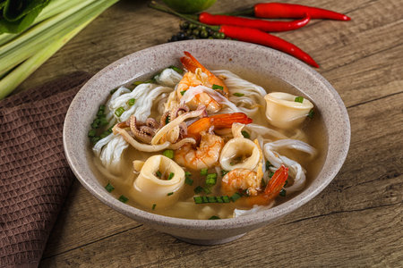 Vietnamese Pho Bo soup with seafood prawn and squid