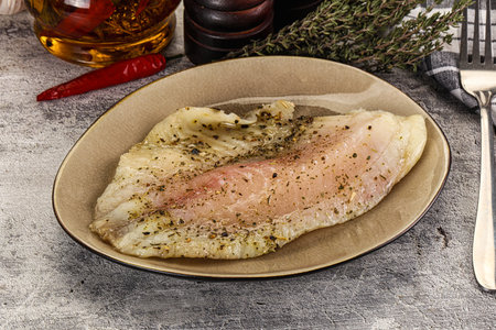 Baked tilapia fish fillet with spices
