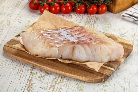 Raw Pollok fish fillet for cooking