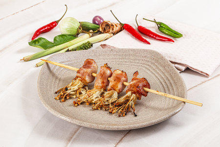 Thai Street foof satay with bacon and mushroom enoki skewerの写真素材