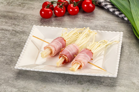 Raw roll with enoki mushroom and baconの写真素材