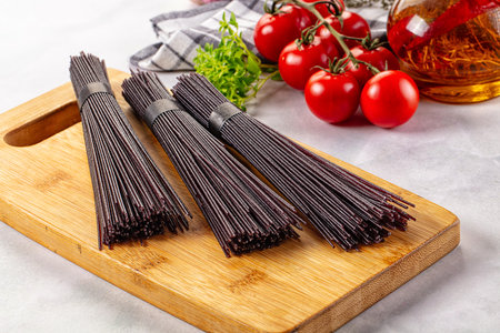 Raw black rice noodles lines pastaの写真素材