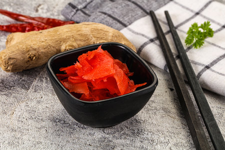 Marinated spicy ginger root in the bowlの写真素材