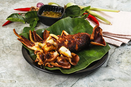 Delicous Grilled squid with sauce and spices