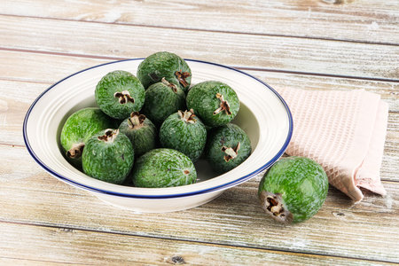 Sweet ripe juicyfruit feijoa in the bowlの写真素材