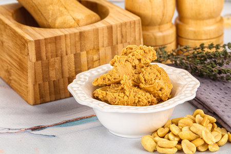 Crunchy peanut butter fat product for breakfast