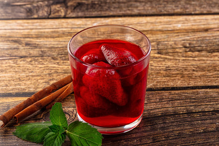 Sweet juicy cold strawberry lemonade served mint