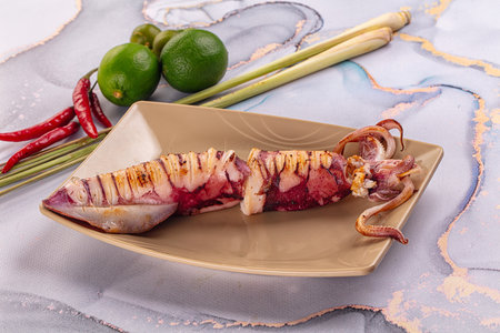 Tasty grilled wild squid with lime - Asian streetfoodの写真素材