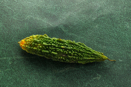 Raw green exotic tropical bitter melon vegetableの写真素材