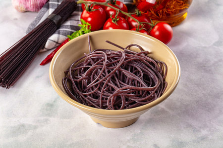 Boiled black rice noodles spaghetti pastaの写真素材
