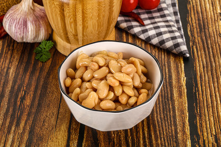 Baked white organic beans in the bowlの写真素材