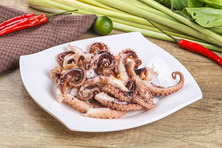 Grilled octopus red tentacle sliced appetizerの写真素材
