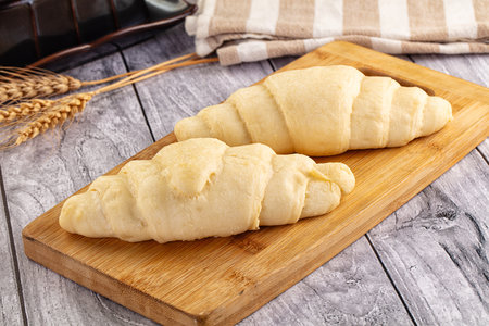 Homemade Raw uncooked croissant for bake