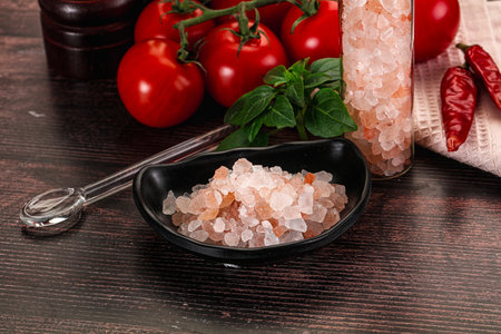Rose pink salt in the bowl for cooking or spa