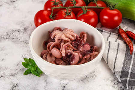 Marinated mini baby octopus in the bowlの写真素材