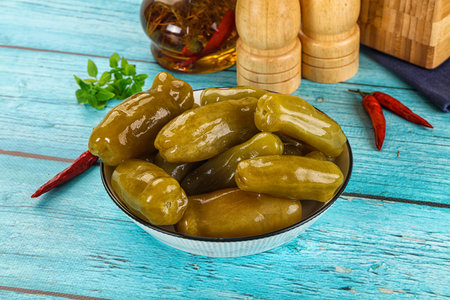 Homemade marinated pickled green tomato heapの写真素材