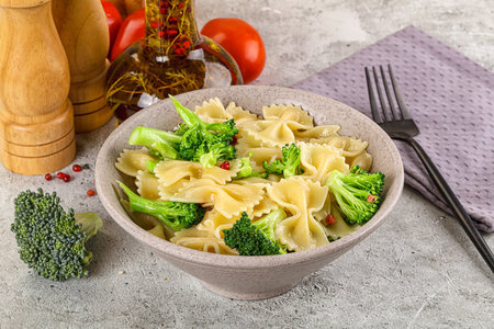 Vegetarian cuisine - Italian pasta farfalle with broccoliの写真素材
